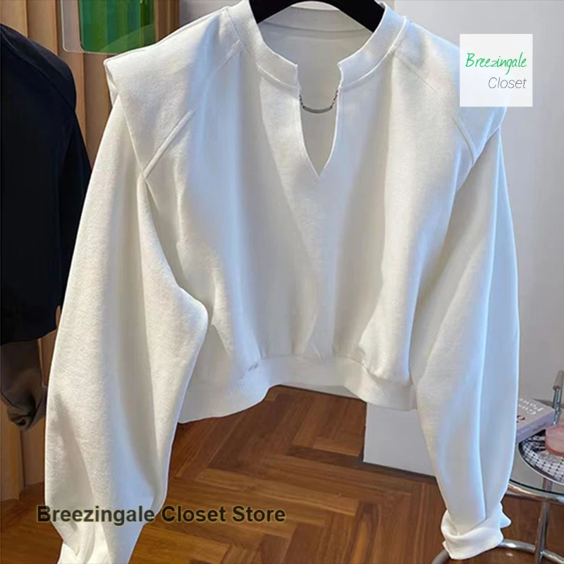 Französischer Stil V-Ausschnitt Schulterpolster kurzer Pullover Damen Frühling und Herbst neue Mode lässig lockeres Nischen-Bottom-Shirt