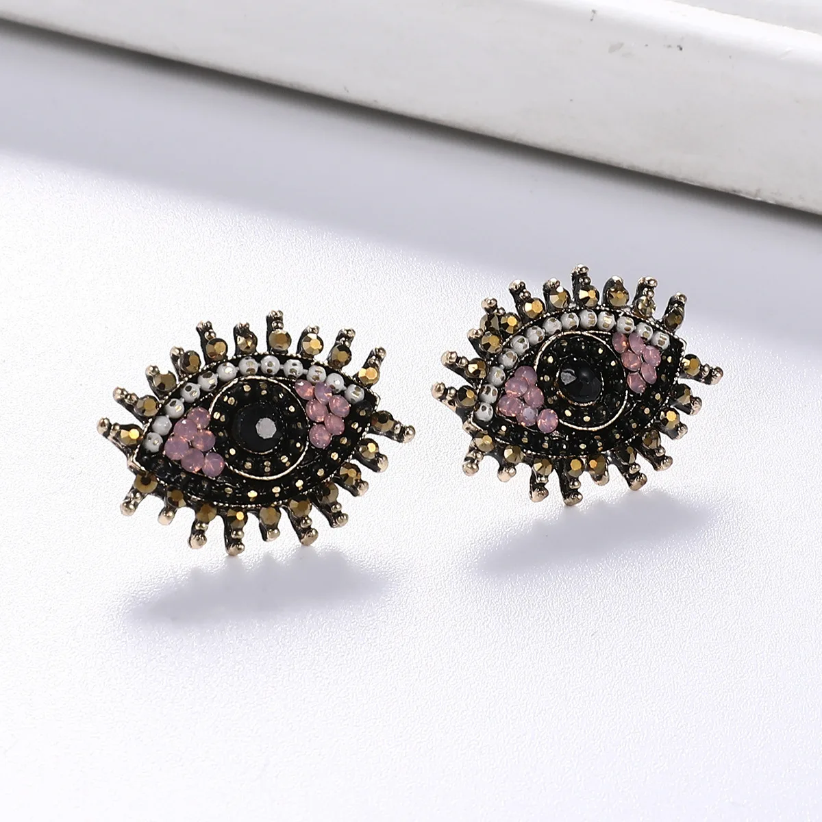 Stylish retro simple full diamond eye earrings earrings personalized alternative hipster earrings wholesale trend