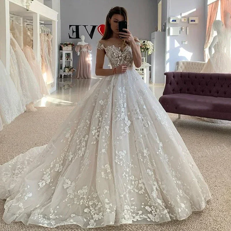 Flavinke カスタマイズされたノースリーブのウェディングドレス O ネックレース花コートトレインプリンセス花嫁ドレスプラスサイズ Vestido de Noiv