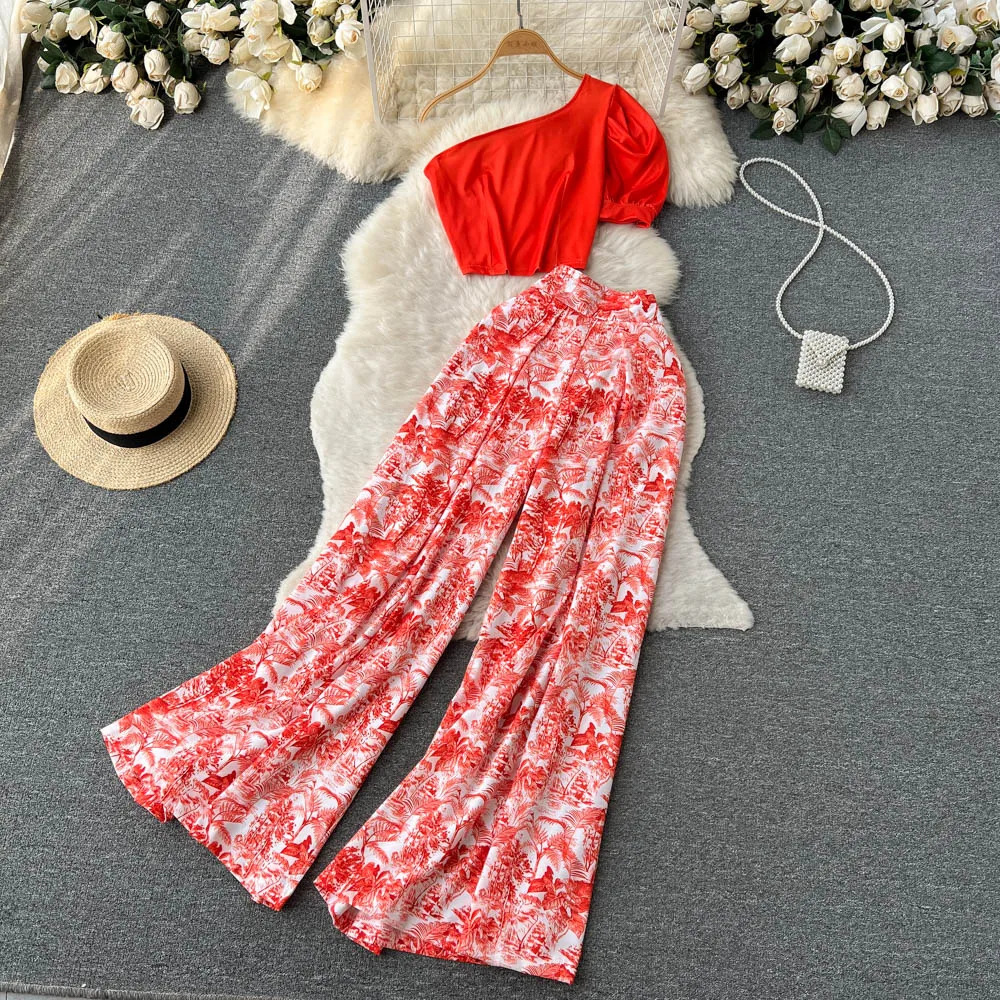 

Spring/Summer 2023 Sexy Set Women's Oblique Shoulder Bra Short Top+Dropping Fragmented Flower Wide Leg Pants Two Piece Set Women