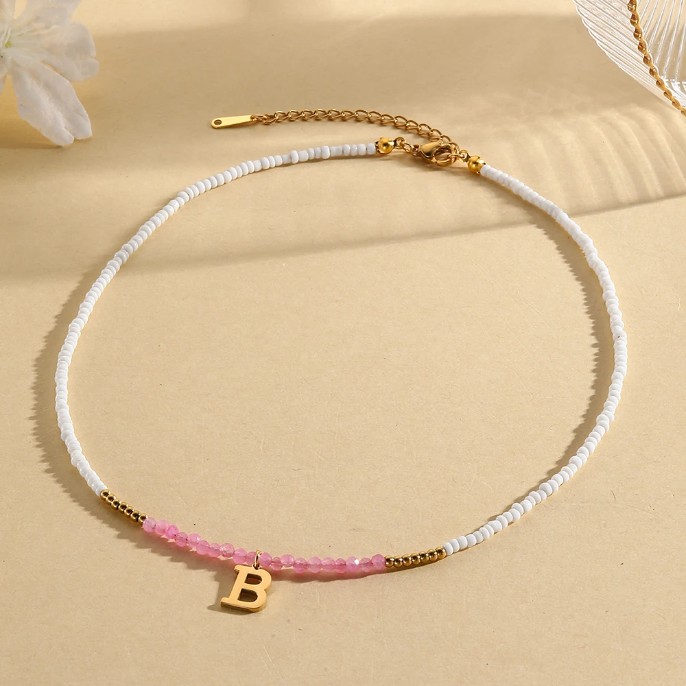 Bohemian style 26 letter pendant women\'s white rice bead pink crystal bead necklace fashionable and simple jewelry gift 2025