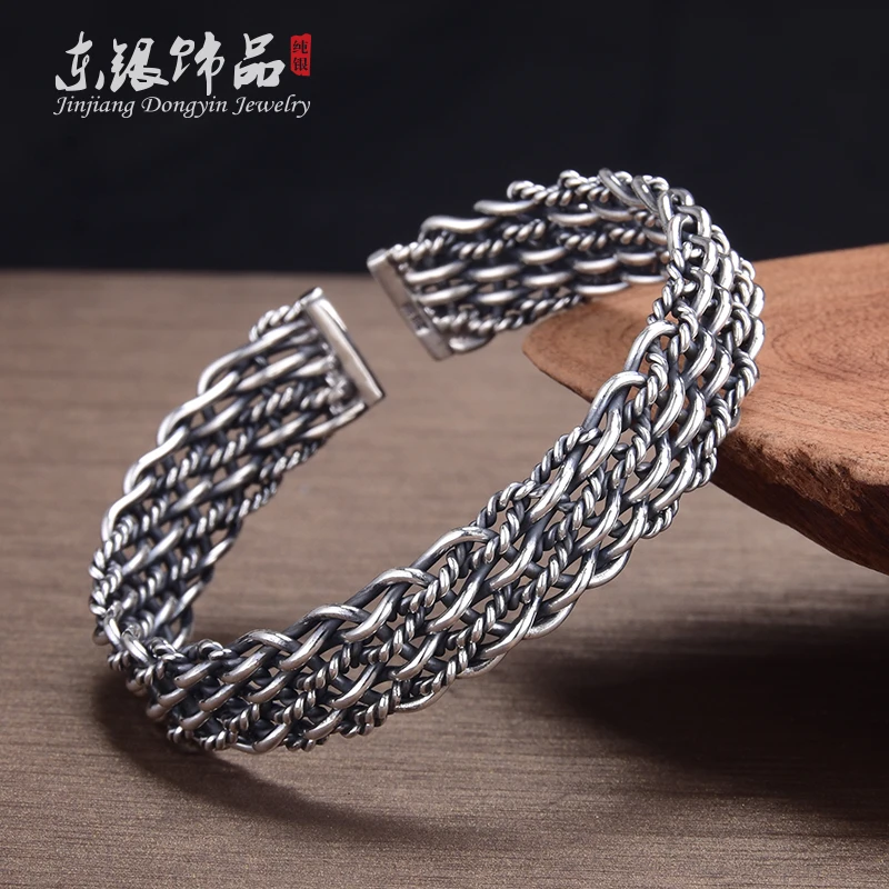 

Pure silver 999 retro ethnic style simple and versatile personality open couple models twist braided intertwined bracelet