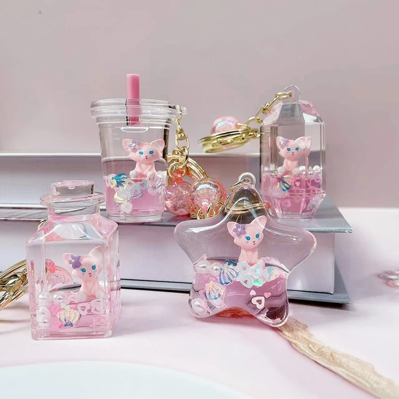 سلسلة مفاتيح كرتونية إبداعية ولطيفة لشخصية لينا بيل، تطفو في سائل زيت ورمل، زينة معلقة، هدية عيد ميلاد، مصنوعة من مادة الأكري...