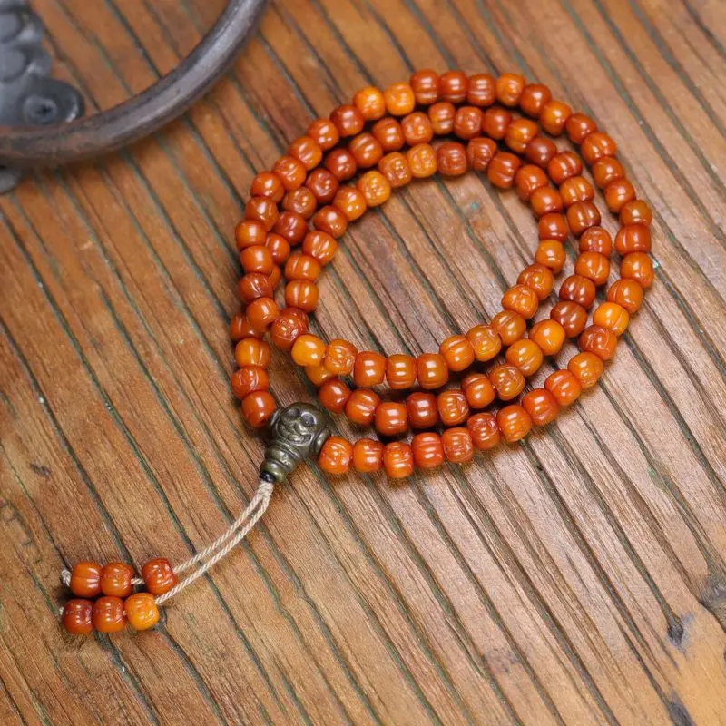 Tibetan Yak Carving, Peach-Shaped Pendant Necklace, Featuring 108 Old Bone Beads
