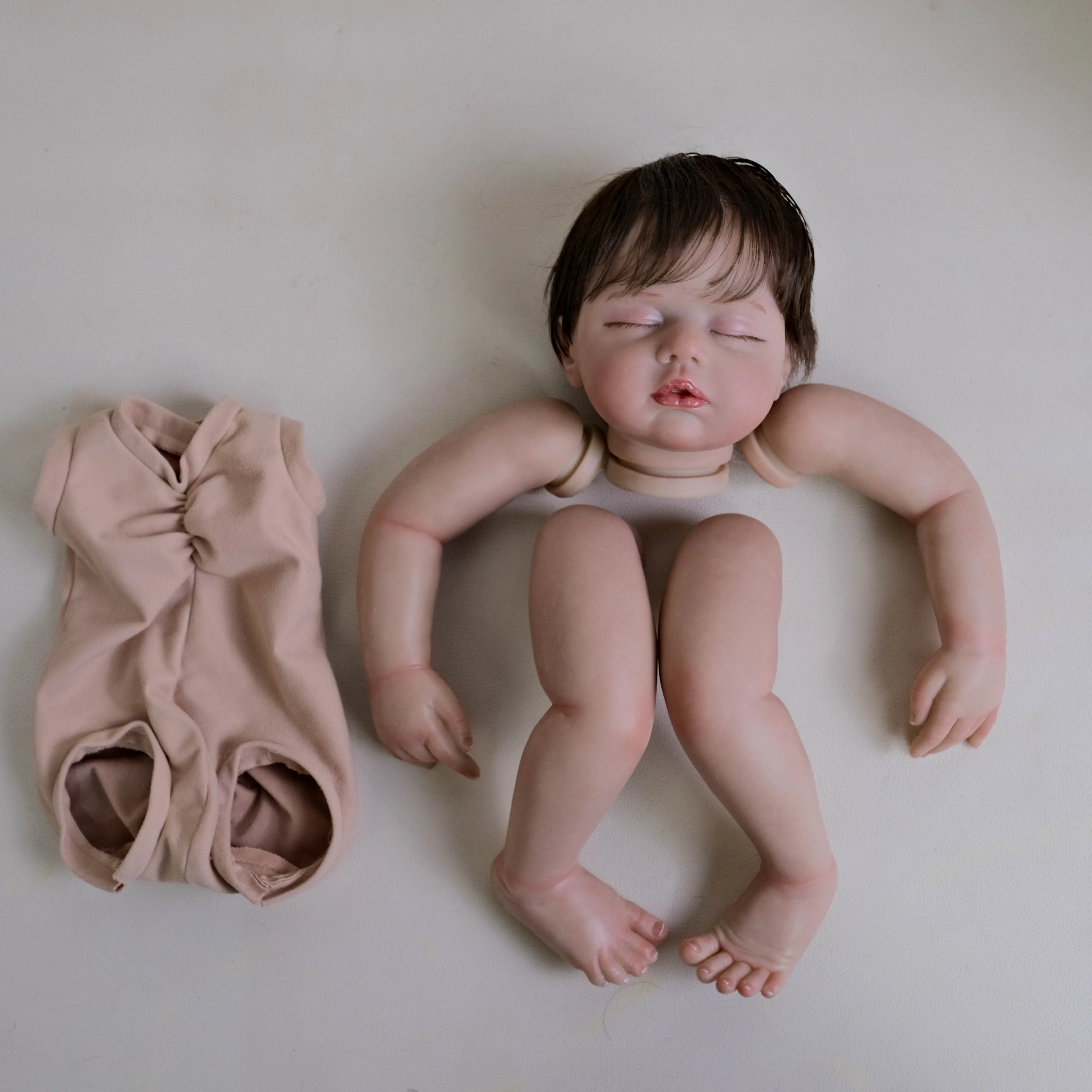 NPK 19inch Zoey Unfinished Painted Doll Kit Reborn Doll Parts with Hand Rooted Brown Hair Lifelike Doll for Collectors