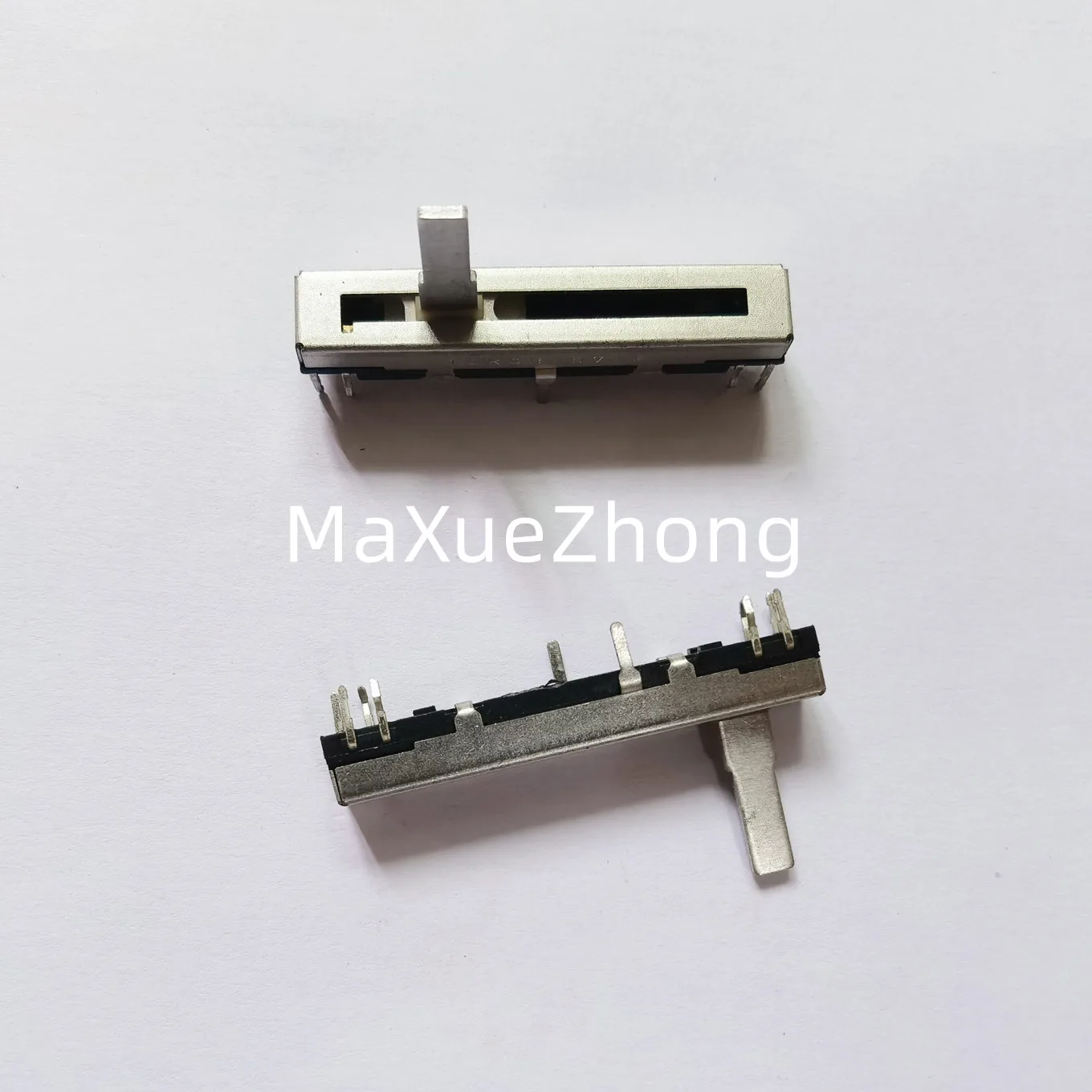 

Original new 100% total length 45MM straight sliding potentiometer B10K axis length 15MM (SWITCH)