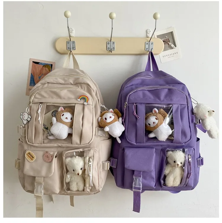 Mochila escolar de nailon con todo colgante para niña, bolso impermeable con bolsillo para estudiante, mochila Kawaii para mujer, paquete de libros para ordenador portátil