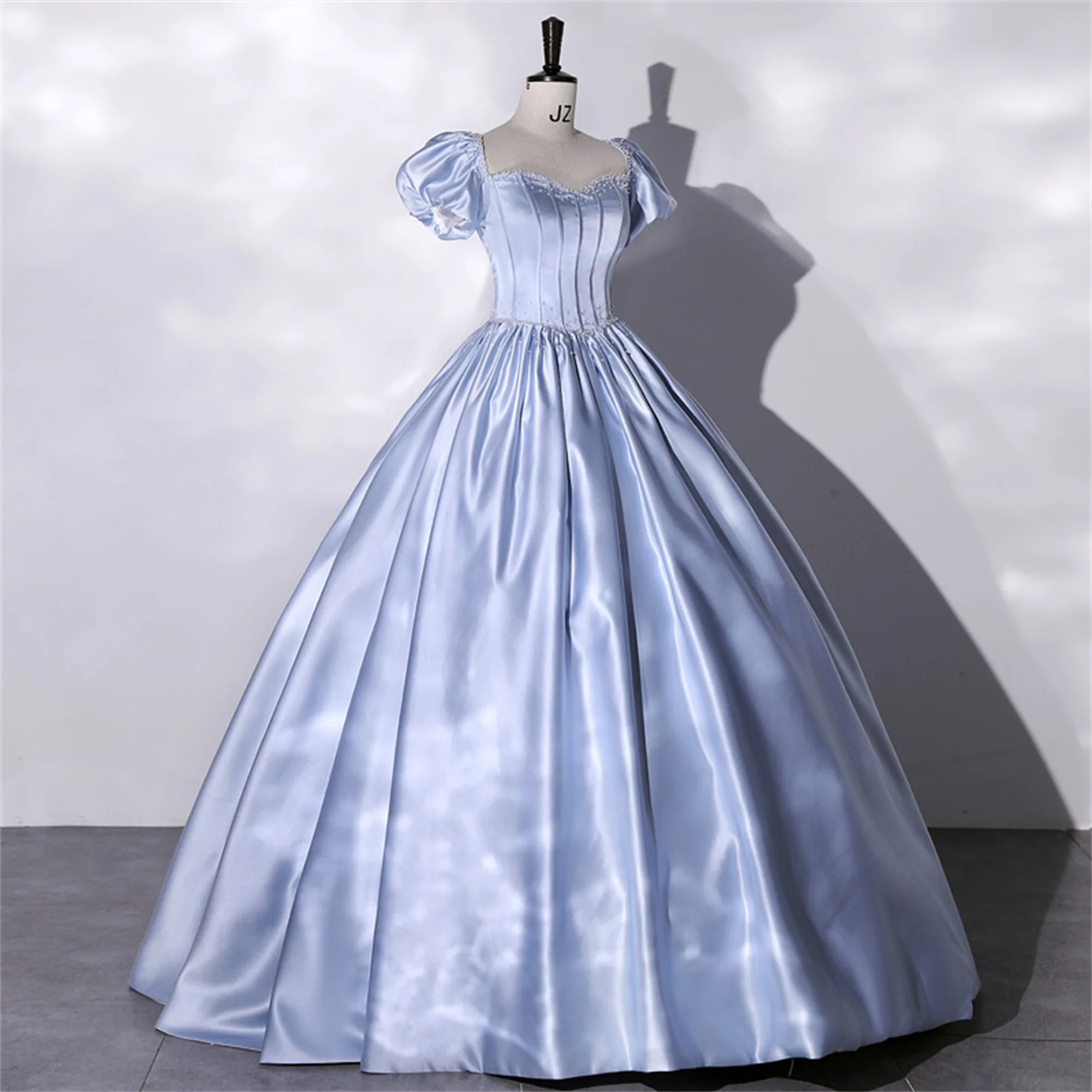 فساتين Quinceanera من الساتان واللؤلؤ بأكمام منتفخة مناسبة رسمية رداء حفلات أعياد الميلاد طول الأرض فيستدو دي فييستا