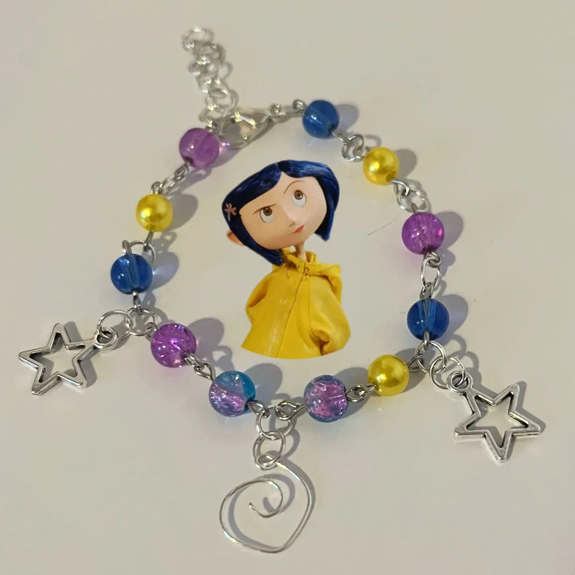 Braccialetti con ciondoli abbinati coraline e wybie fatti a mano