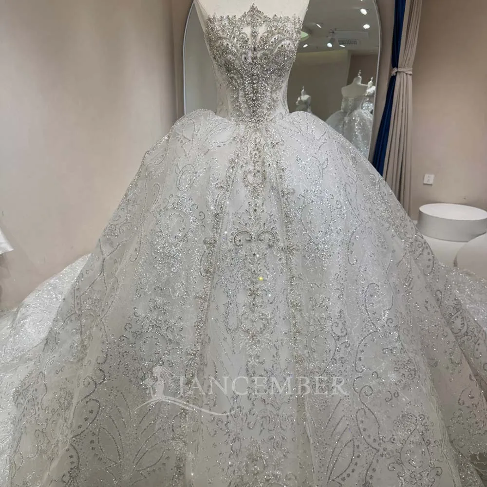 

Customized 2026 Stylish Sleeveless Strapless Ball Gown Wedding Dress Glitter Bridal Gown Beading Plus Size Vestido De Novia