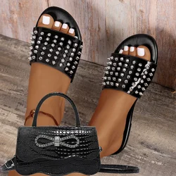 2026 Women's Summer New Metal Rivet Slippers Large Flat Beach Sandals Fashion Water Diamond Bow Shoulder Bag Handbag Set