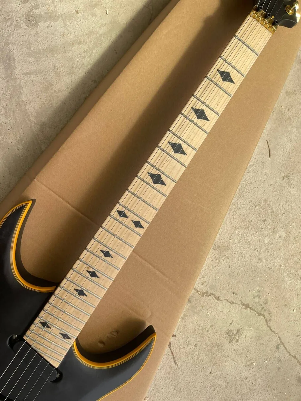 Black Body Electric Guitar with Gold Hardware,Maple Neck,Yellow Binding,Provide customized service