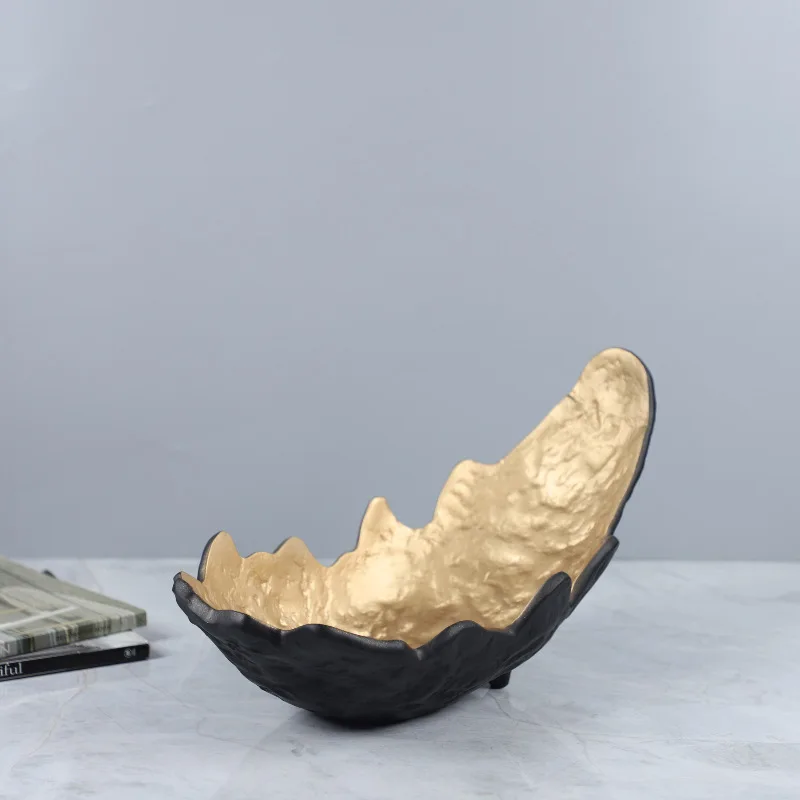 

Modern Minimalist Black and Gold Curved Crescent-shaped Resin Fruit Platter Decorative Tray for Living Room Coffee Table.