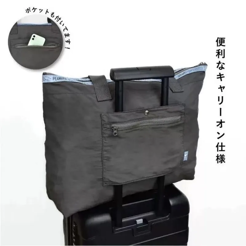 Disney Cute Snoopy Borsa da viaggio per cartoni animati di grande capacità Borsa per bagagli Elegante trolley con maniche Pieghevole portatile Regalo per le vacanze