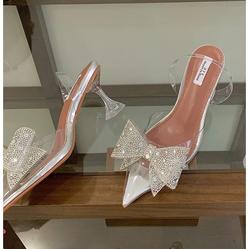 

2026 PVC Transparent Women Pumps Sexy Crystal Bowknot Pointed Toe Slingback High Heels Mules Sandal Female Wedding Prom Shoes