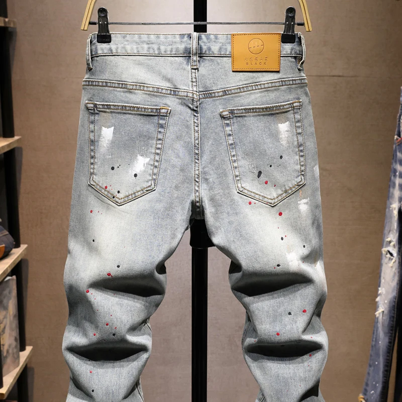 Pantalones vaqueros rasgados pintados ajustados elásticos azules lavados Retro a la moda de diseñador callejero para hombre Y2K Hip Hop Vintage pantalones vaqueros
