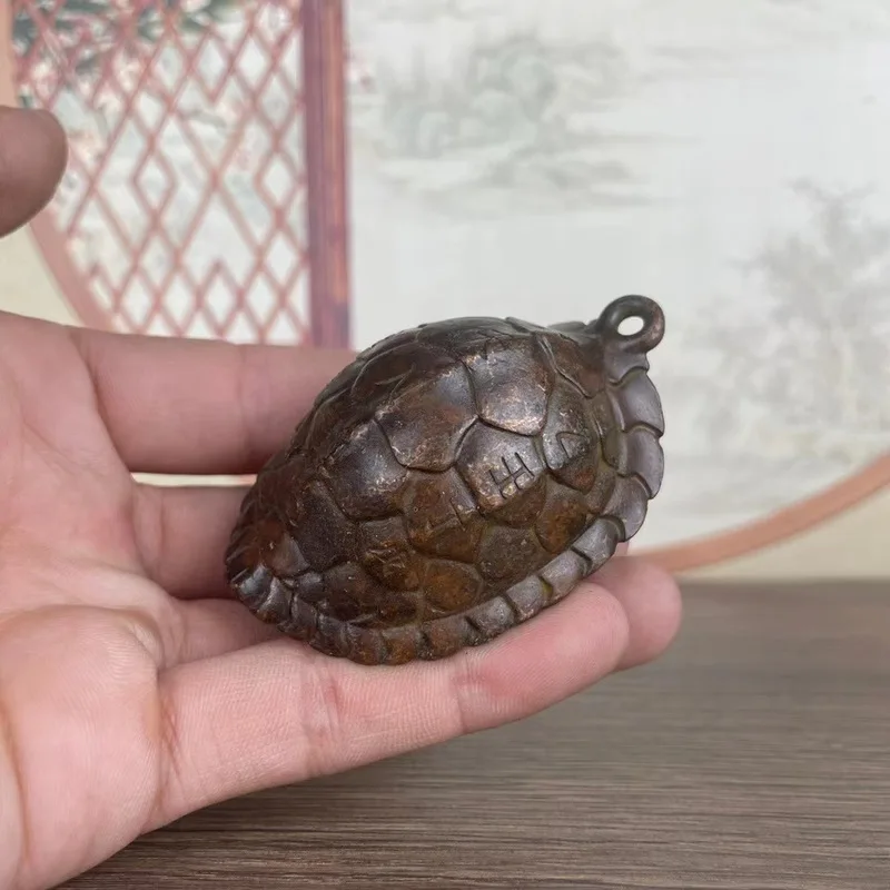 Copper , symbolizing wealth and prosperity, turtle shell pendant, a cultural artifact for men to carry with them