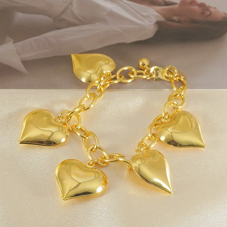 9999 gold - A luxurious retro-style bracelet featuring heart-shaped hollow design. Suitable for daily  special occasions.