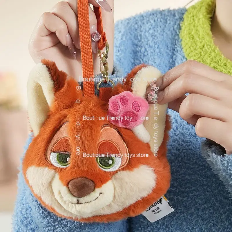 Disney Zootopia Judy Nick leopardo oficial cartera auricular portátil Mini llavero lindo dibujos animados monedero de felpa colgante Decoración