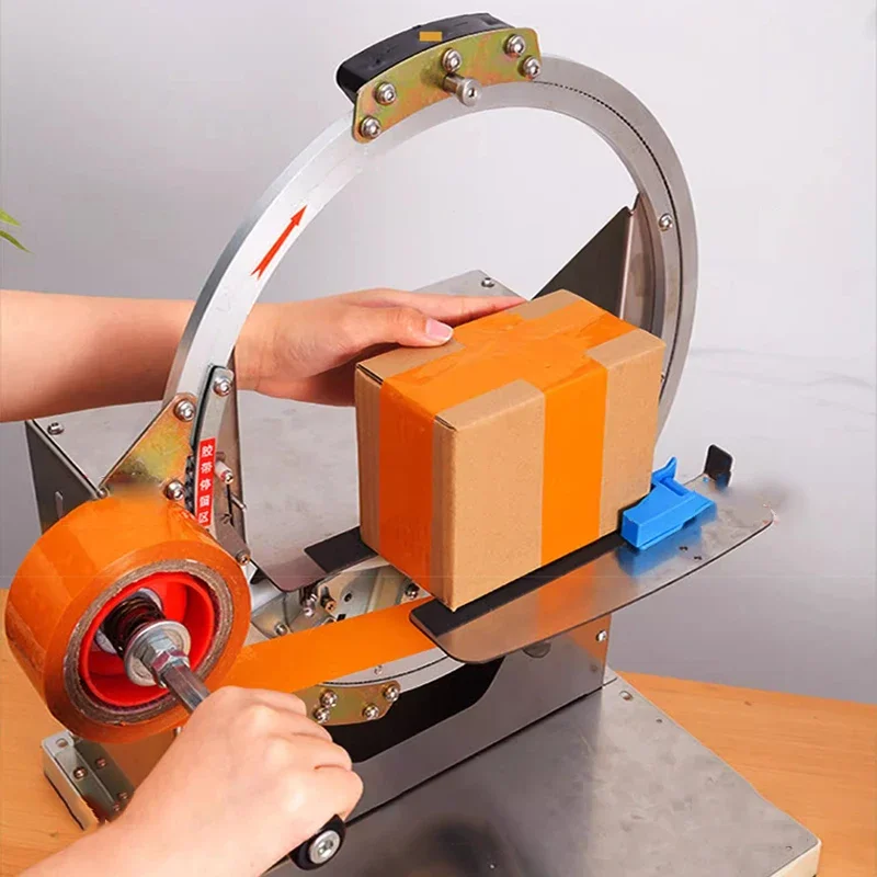 半自動包装機,小さな段ボール箱,テープ包装