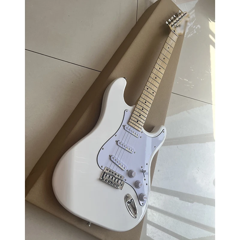 

Famous st electric guitar, single shake vibrato system, bright and clean white, professional level, free delivery to home.