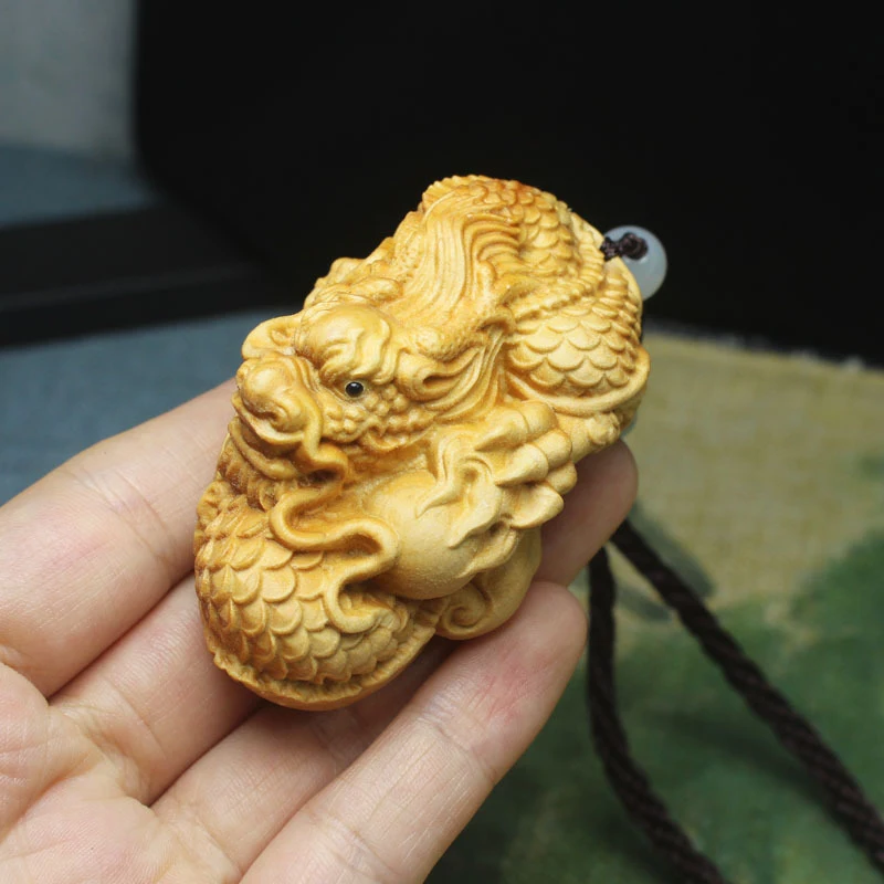 Cypress wood dragon playing with pearls hand-held ornament, three-dimensional carved dragon decorative craft