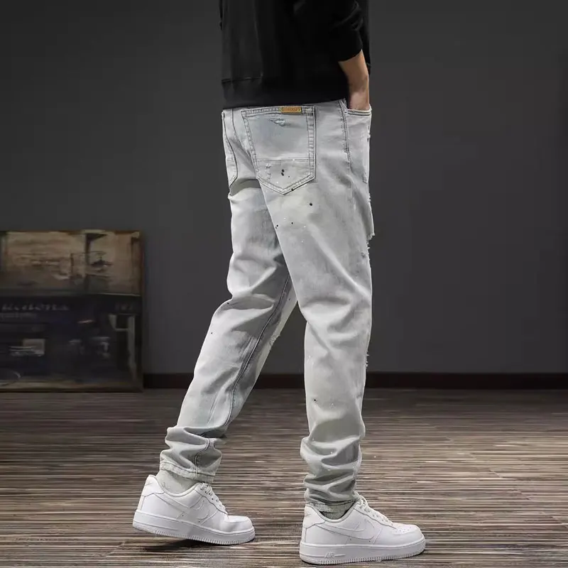 Korean fashion designer men's blue jeans retro elastic slim fit patchwork retro jeans men's casual denim pencil pants hombre