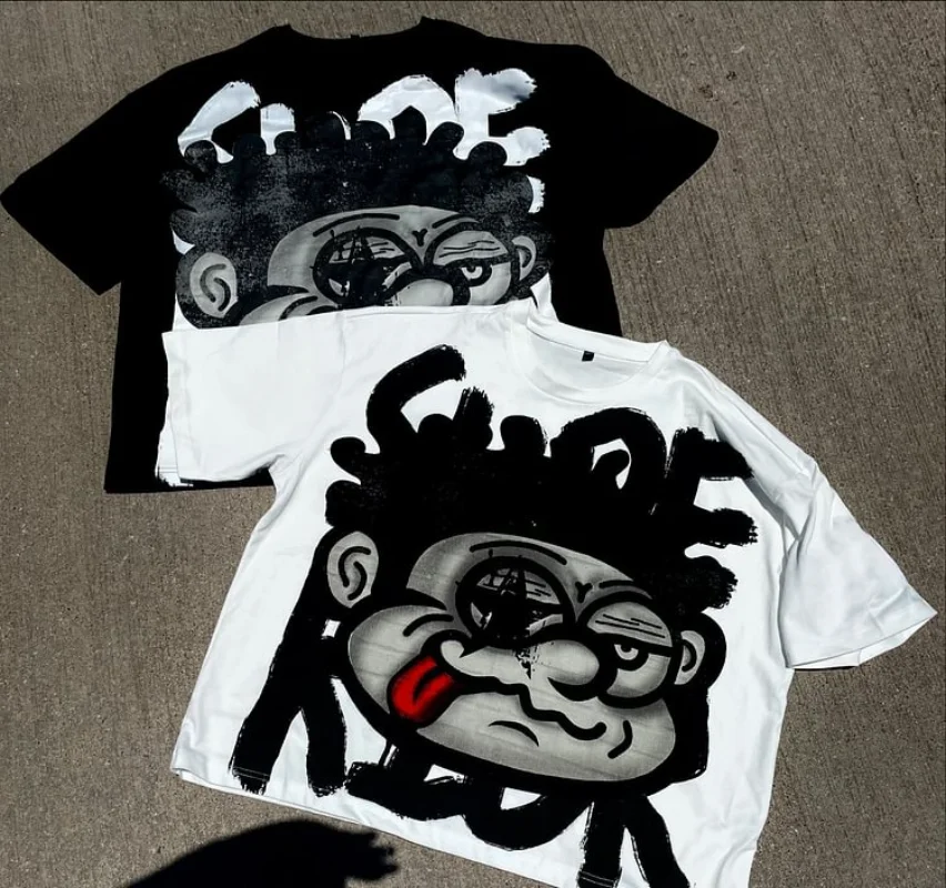 

Streetwear Graphic T-Shirt with Vintage Cartoon Monster Print 100% Cotton Short Sleeve Y2K Summer Harajuku Oversized Shirts