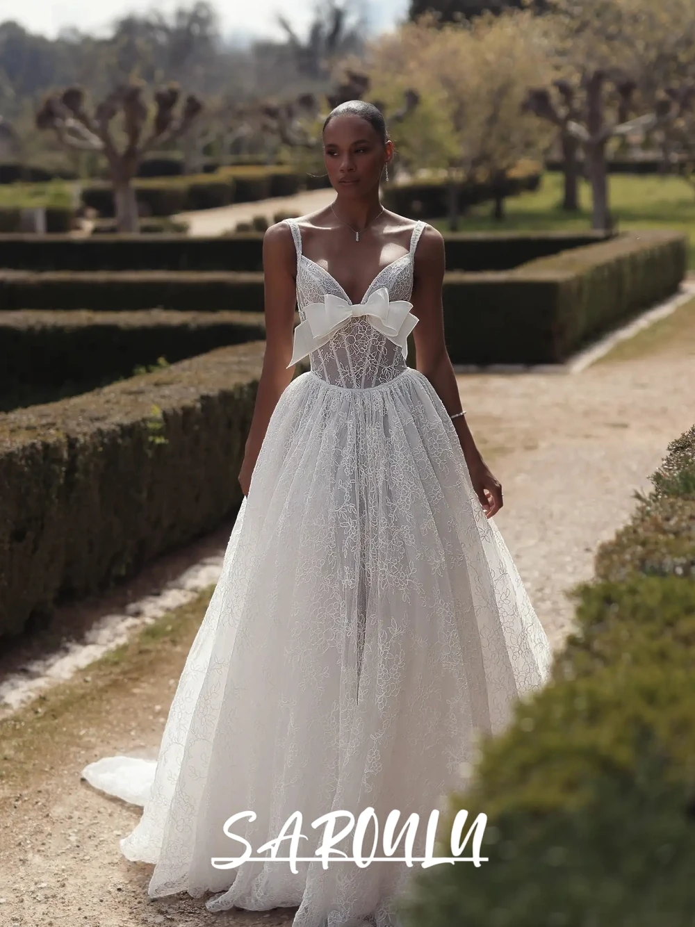 

Intricate Lace Wedding Dress With Bow Detail Romantic A Line Customized Bridal Gown Sexy Deep V Neck Low Back Bride Wear
