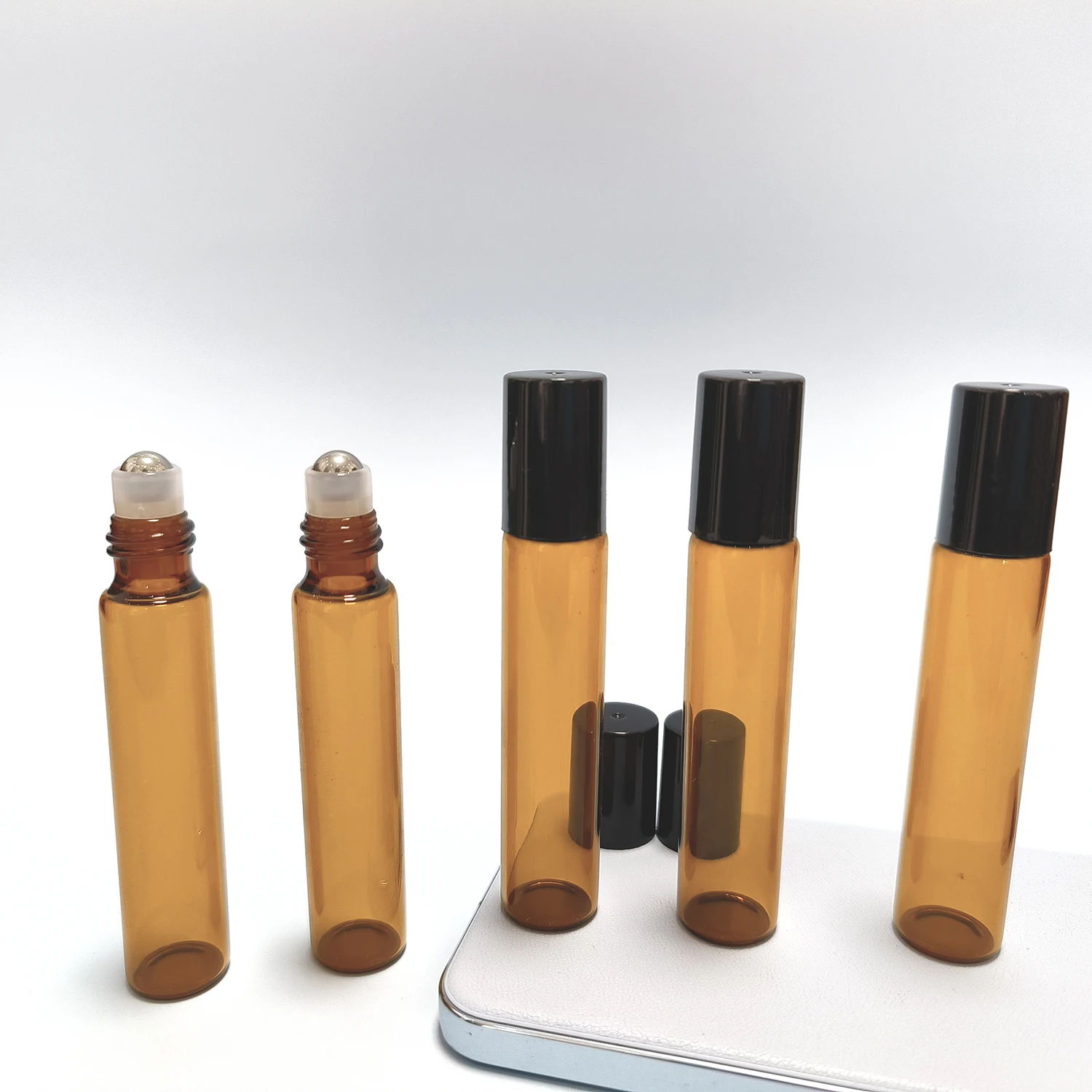 5PCS 5/10ML Amber Roller Ball Essential Glass Oil Bottle Empty Perfume Roller Ball Refillable Liquid Container Makeup Tool