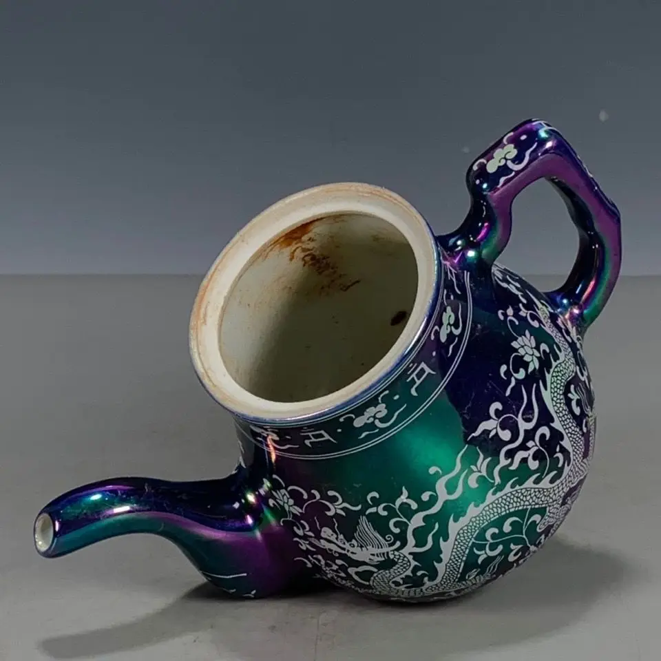 A replica of a dragon-patterned seven-color teapot made during the Ming Dynasty during the Chenghua period of China