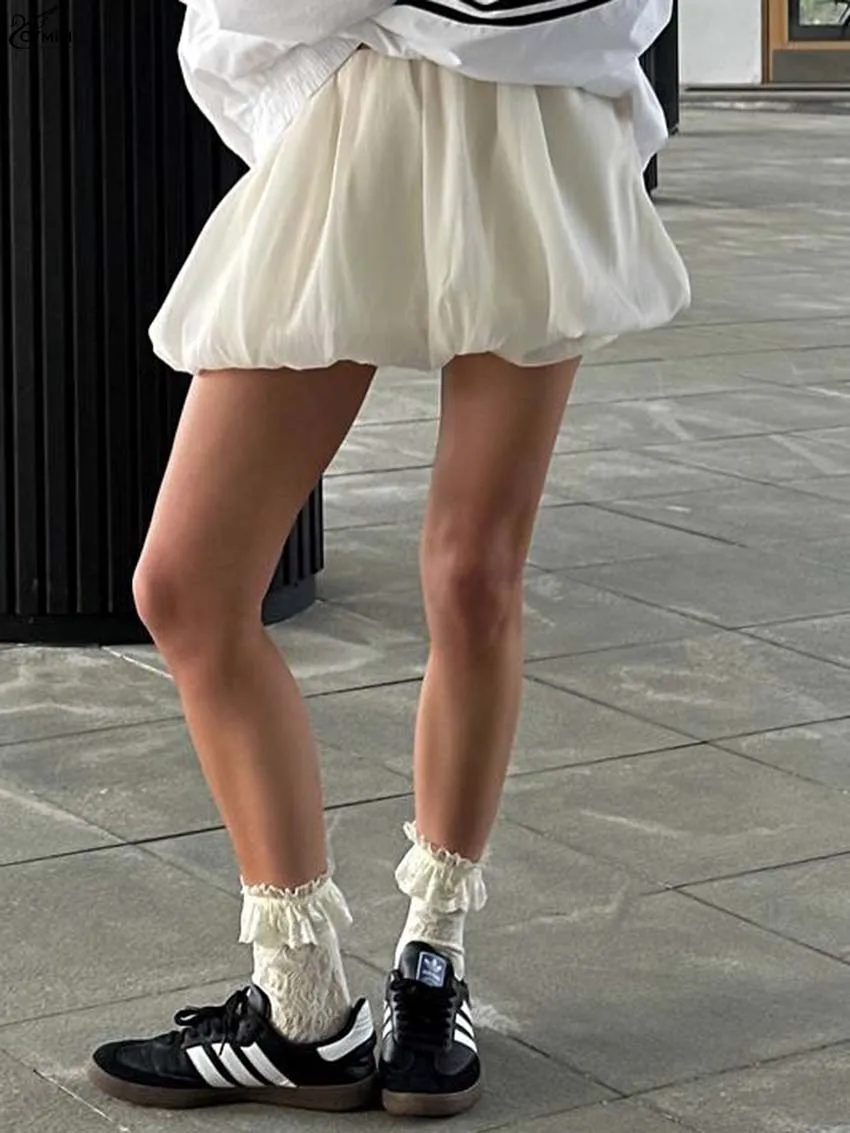 

Oymimi Fashion Beige Slim Skirts For Women Casual Low Waisted Pleated Bud Skirts Elegant Solid Mini Skirts Female Clothing