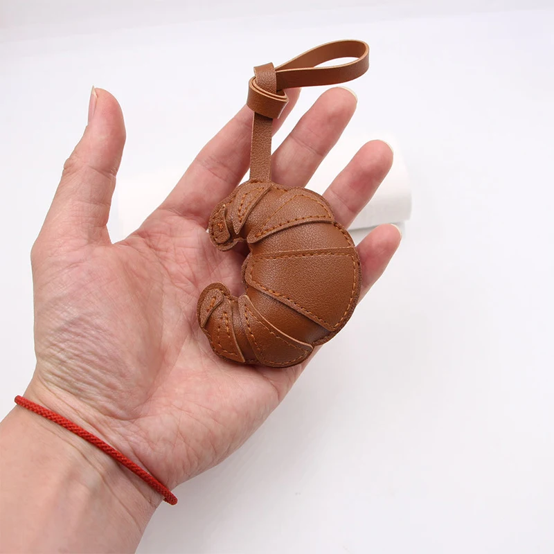 جديد الإبداعية الكرواسون المفاتيح الجلود الخبز شكل حقيبة يد حقيبة ساعي حقيبة تحت الإبط قلادة إكسسوارات الأمتعة سيارة الداخلية