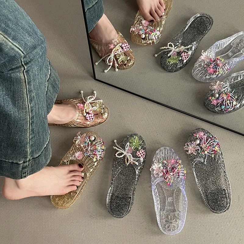 Jelly shoes women's Korean version fashion outer wear flat-soled bag head shoes transparent shoe flower accessories beach shoes view 4