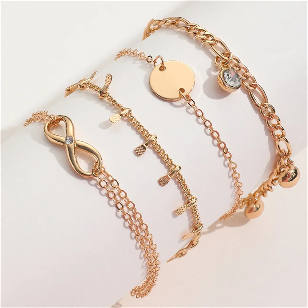 Set di quattro braccialetti color oro con combinazione di braccialetti con strass e paillettes in acciaio inossidabile per regali di gioielli con