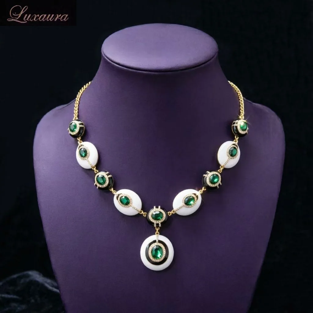 

Vintage jewelry featuring a fashionable and classic white geometric necklace design paired with Bohemian style women's necklace