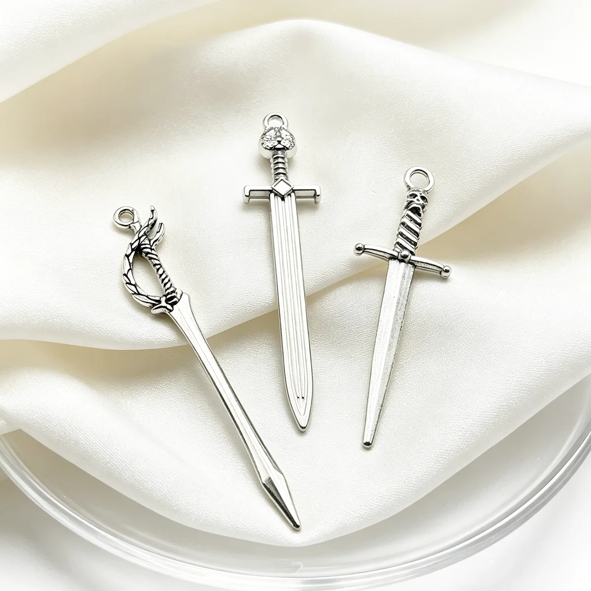 6-Piece Set of Long Swords for DIY Handmade Accessories, Featuring Three Designs: Embossed Long Swords, Short Swords with Skull Handles, and Long Swords with Vine Wrapping, Suitable for DIY Bracelets, Necklaces, Earrings, Pendants, and Handmade Beaded Decoration Accessories