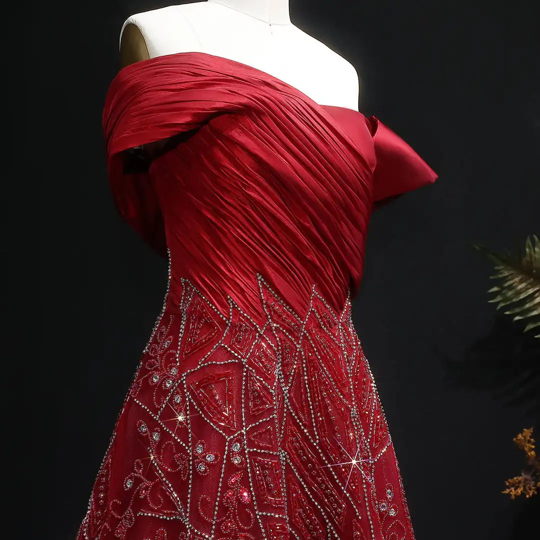 فساتين سهرة مطرزة باللون الأحمر بدون أكتاف من Jirocum مع قطار بتفاصيل فيونكة على شكل حرف A فساتين حفلات رسمية