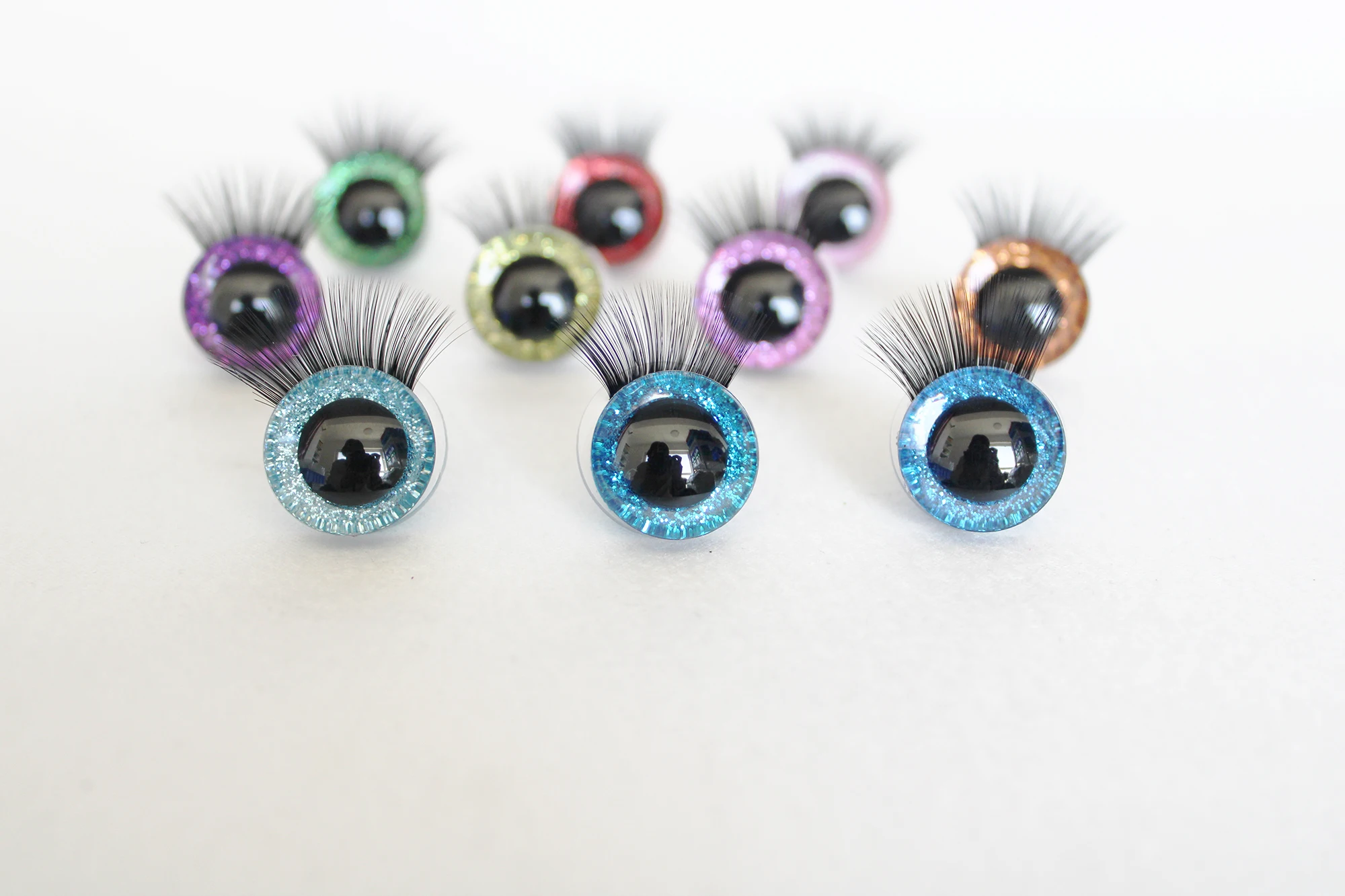 

100PCS/LOT 9MM 12MM TO 30MM NEW 3D PUPIL GLITTER TOY EYES WITH BLACK EYELASH TRAY WITH HANDPRESS WASHER COLOR SIZE OPTION