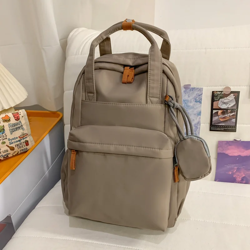 

Simple large-capacity backpack for female college students, lightweight travel backpack, laptop bag, suitable for commuting to w