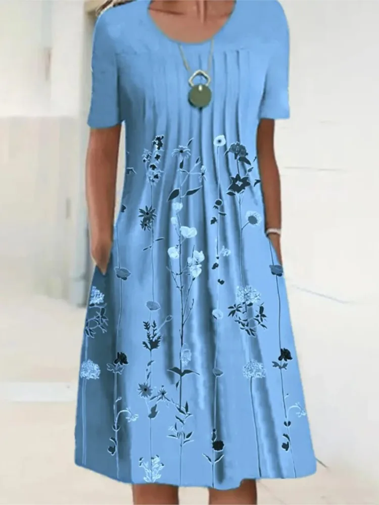夏のファッション自由奔放に生きる花柄ポケットミディドレス女性のための O ネック半袖カジュアルルーズドレス女性の婦人服