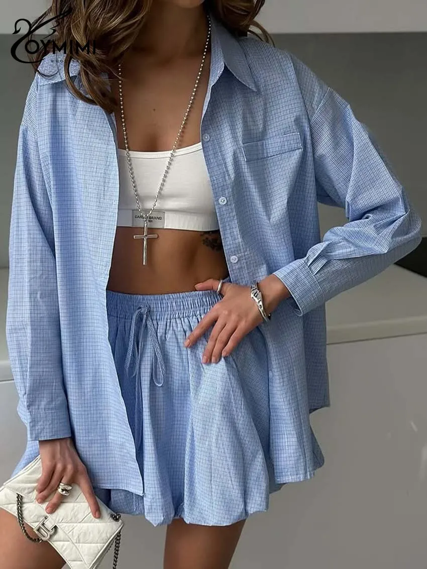 ชุดเซ็ตสองชิ้นสำหรับผู้หญิงลายพิมพ์สีน้ำเงินลำลอง แบรนด์ Oymimi เสื้อเชิ้ตแขนยาวติดกระดุมแถวเดียวมีกระเป๋า และกระโปรงมินิสเกิร์ตผูกเชือก