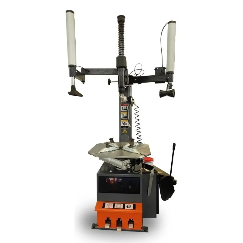 Semi-automatic tire changer with 220 volts power supply with auxiliary arm and plastic cover