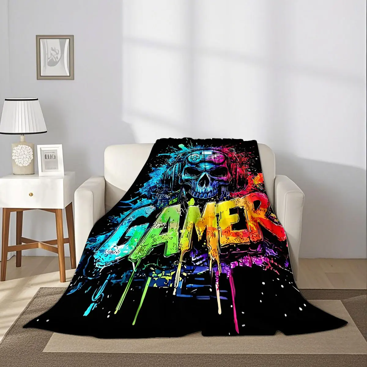 A Gaming-Themed Skull Blanket with Colorful Splatter Graffiti Design, Made of Soft And Warm Flannel Material, Perfect for Use in