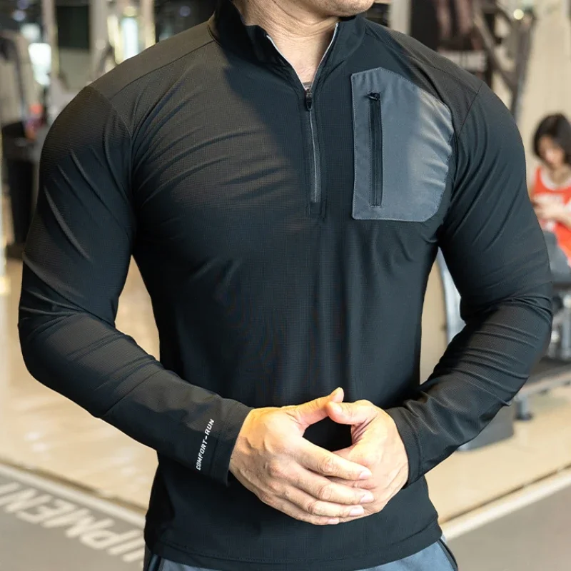 

Mens Muscle Workout Sportswear Long Sleeve Running Clothing with Half Zip with Pockets Sports Gym Tees Fitness Compression Shirt