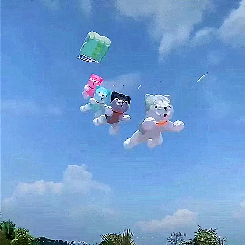 Free shippingdog kite pendant inflatable kite trompo de madera basta juego de mesa spinning boy rope outdoor games flying bird