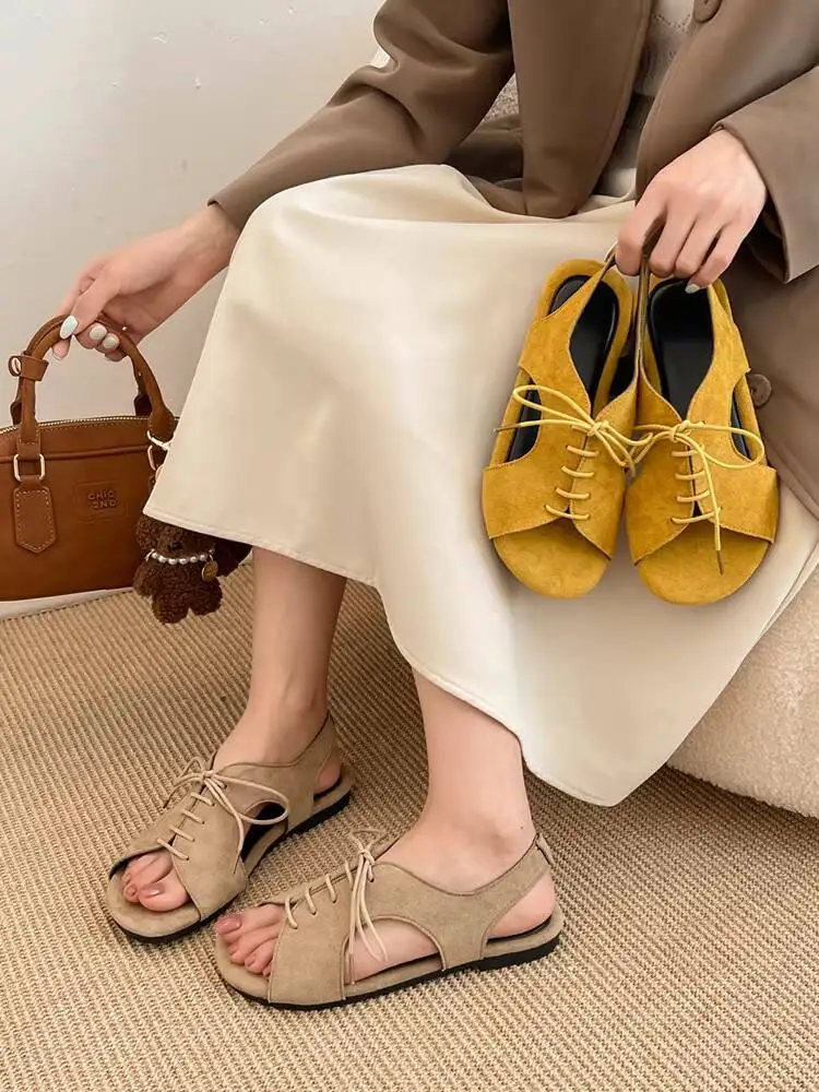 

2026 New Retro Hollow Lace Up Roman Sandals For Women Versatile One Strap Open Toe Casual Beach Flat Sandals