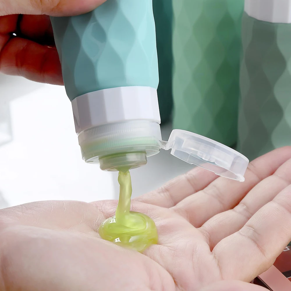 زجاجات ضغط للسفر من السيليكون مكونة من 4 قطع - موزع مانع للتسرب لغسول الشامبو وغسول الجسم، وحاويات تخزين مدمجة لـ Busi #4