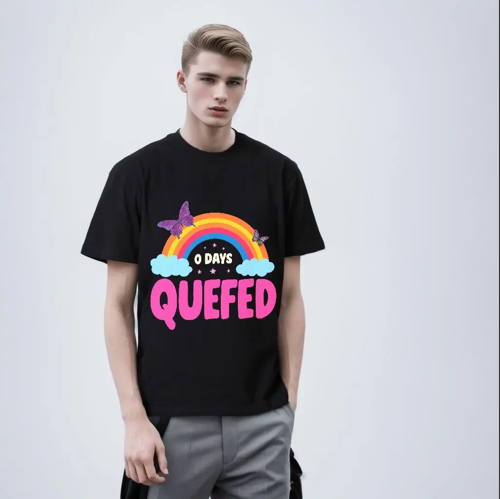 تي شيرت أبيض بتصميم جرافيك ملون: قوس قزح نابض بالحياة، فراشات، سحاب رقيق، نص '0 أيام'، جريئة 'QUEFED' - كاجوال