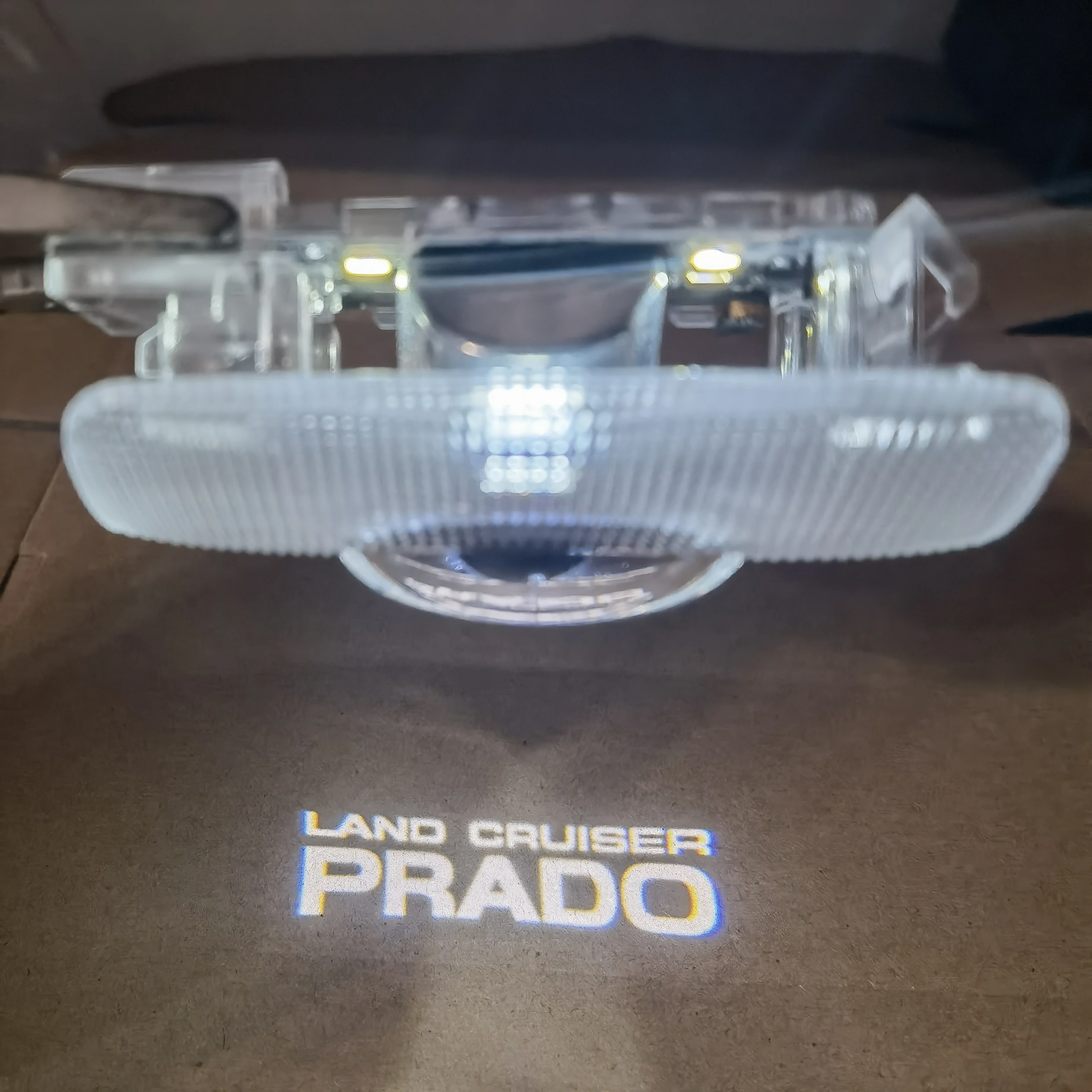 

2 шт./компл. светодиодный светильник Shadow Land Cruiser Prado, приветственный светильник Land Cruiser Prado, дверной светильник, автоматические проекторы, люминесцентный свет, лампа для пудинга